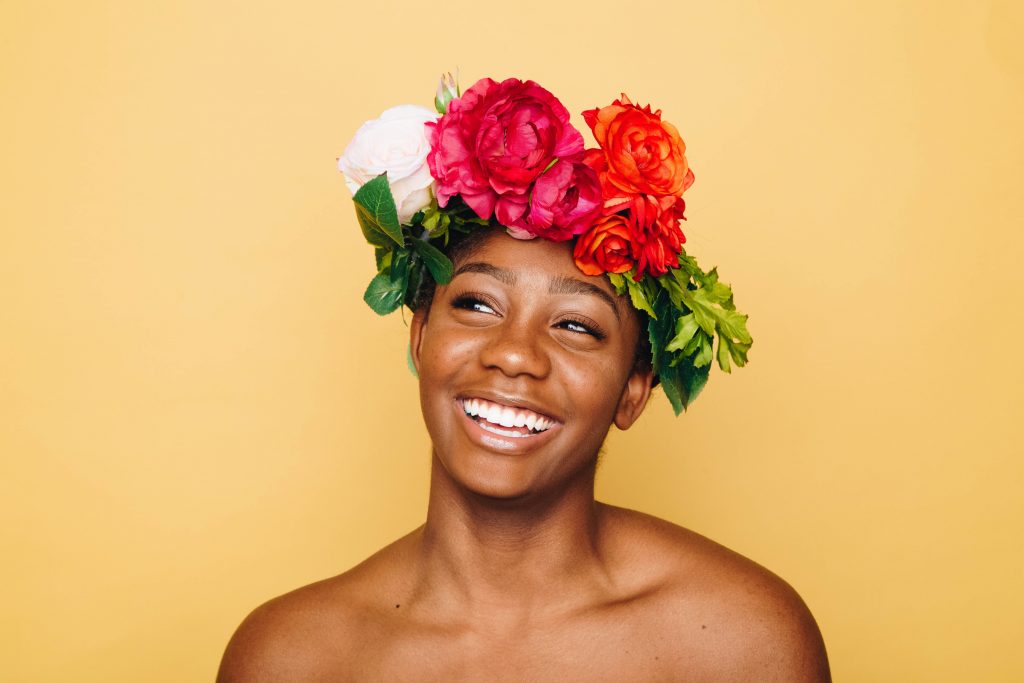 Happy African American woman wearing flower crown