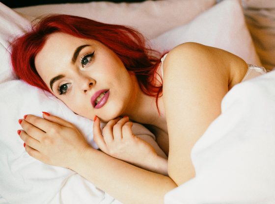 red head awake in bed