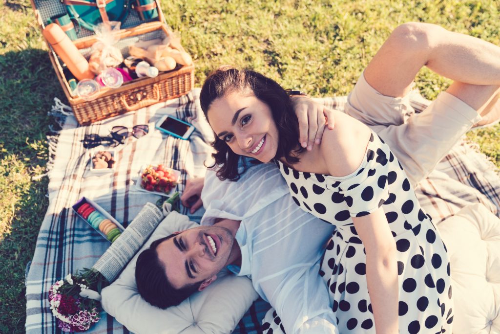 happy couple having a picnic