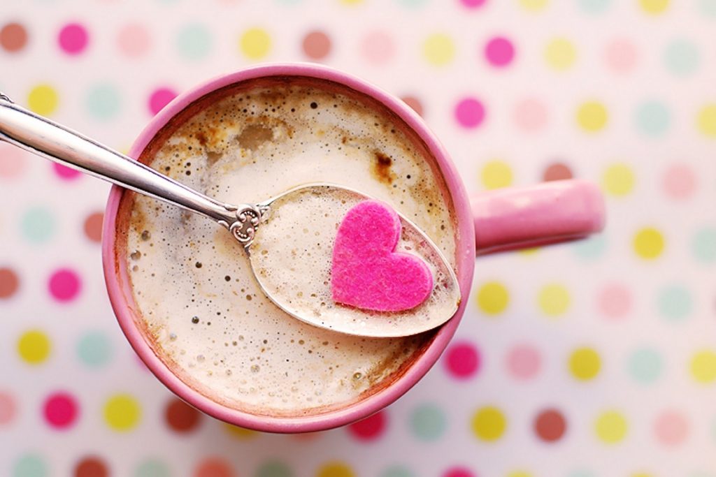 pink heart in coffee