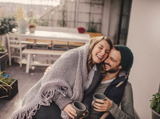 cozy couple sitting with coffee