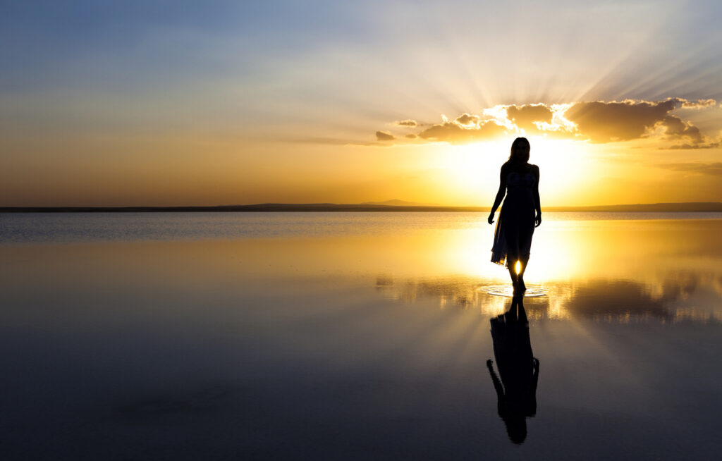 woman walking into horizon