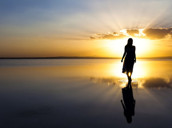 woman walking into horizon