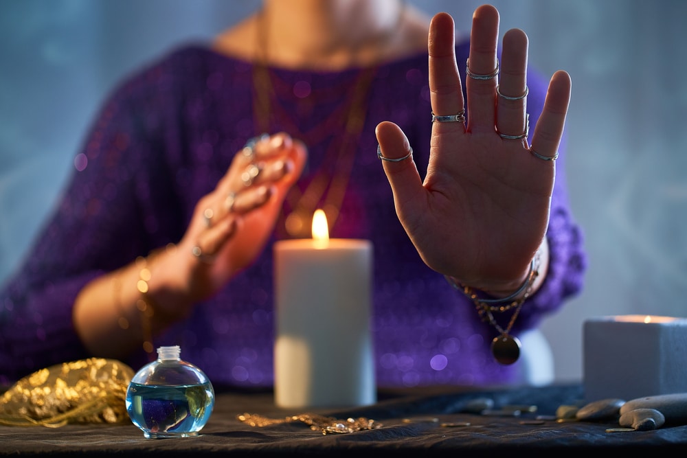 Close-up of a psychic medium giving a reading