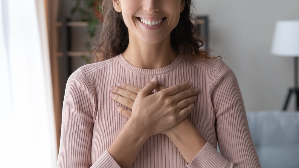 A woman expressing gratitude